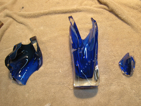 Contemporary blue vase glass art sculpture broken