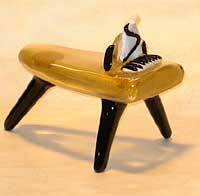 Murano glass piano sculpture repaired by Michael Bokrosh